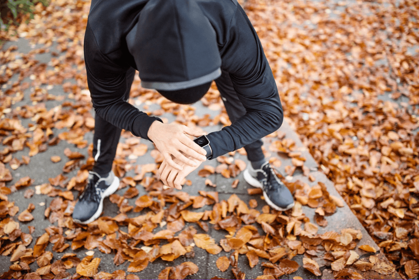 Runner checks sports watch