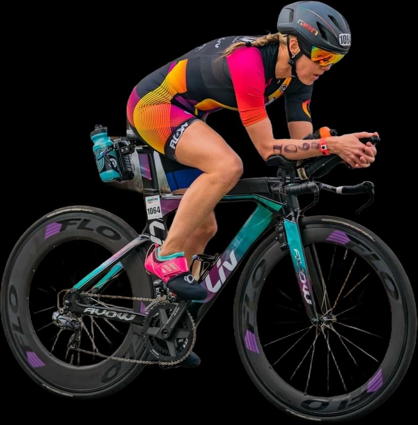 An 80/20 athlete in an aero tuck on a time trial bike.